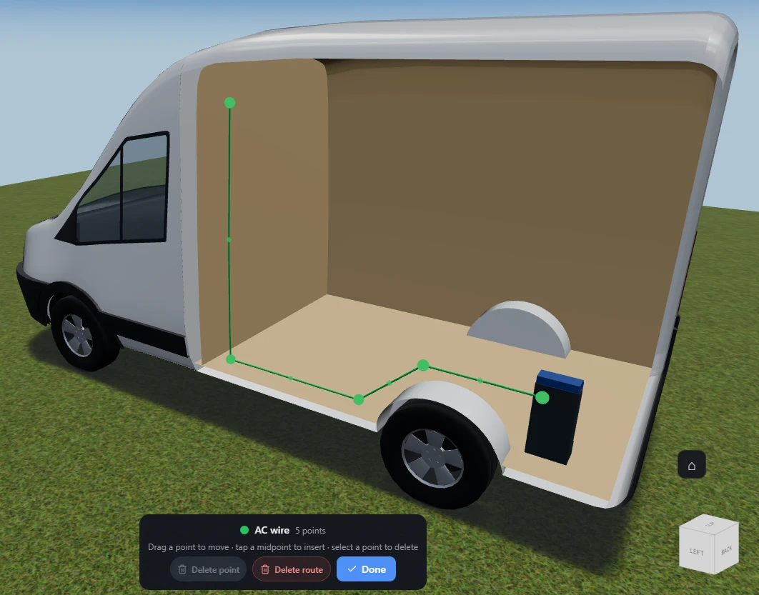 An AC wire run selected in VanCAD’s 3D view, running down the bulkhead, along the floor past the wheel arch and up to a leisure battery, with a draggable handle at each of its five points and a smaller marker at each midpoint. The run-editing banner across the bottom reads AC wire, 5 points, drag a point to move, tap a midpoint to insert, select a point to delete, with Delete point, Delete route and Done.